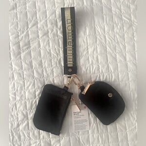 Lululemon Black and Gold Accent Wristlet